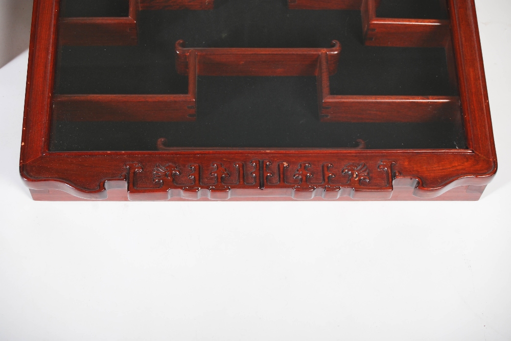 A pair of Chinese dark wood wall mounted display cabinets, the glazed cupboard doors opening to - Image 5 of 5