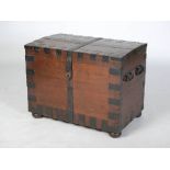 A 19th century oak and iron bound silver chest, the hinged rectangular top opening to a fitted