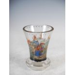 A late 19th/early 20th century Continental enamelled glass beaker, decorated with piper and