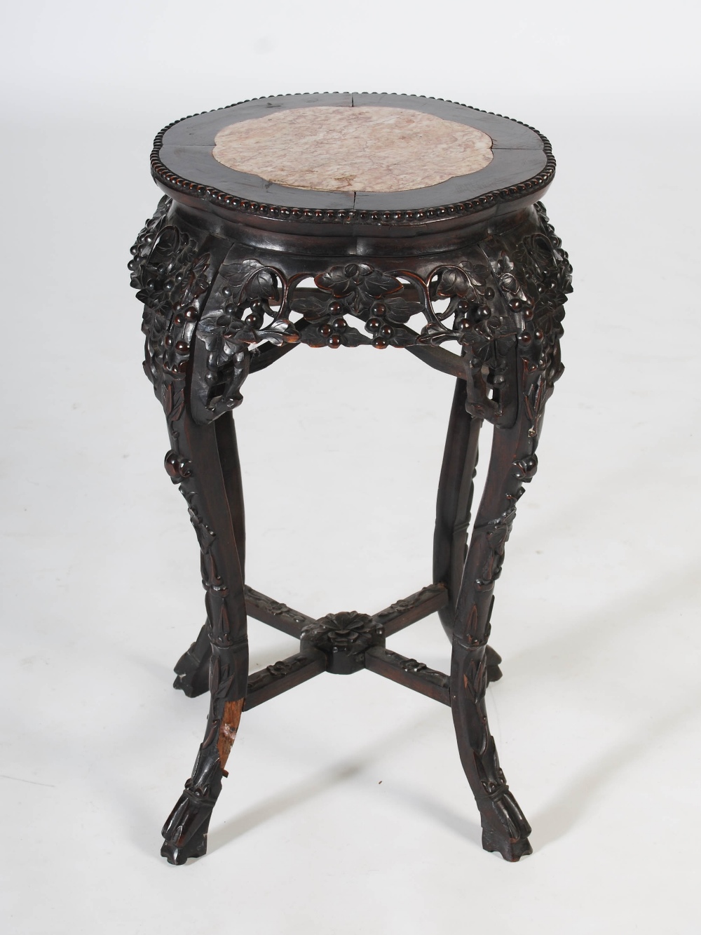 A Chinese dark wood jardiniere stand, Qing Dynasty, the shaped circular top with a mottled red - Image 3 of 7
