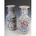 A pair of Chinese porcelain famille rose Canton vases, Qing Dynasty, decorated with rectangular