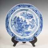 A Chinese porcelain blue and white octagonal shaped soup plate, Qing Dynasty, decorated with pine