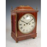 A George III style mahogany and gilt metal mounted bracket clock, the 8" enamel dial with Roman