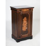A Victorian ebonised and marquetry inlaid side cabinet, the rectangular top above a frieze inlaid