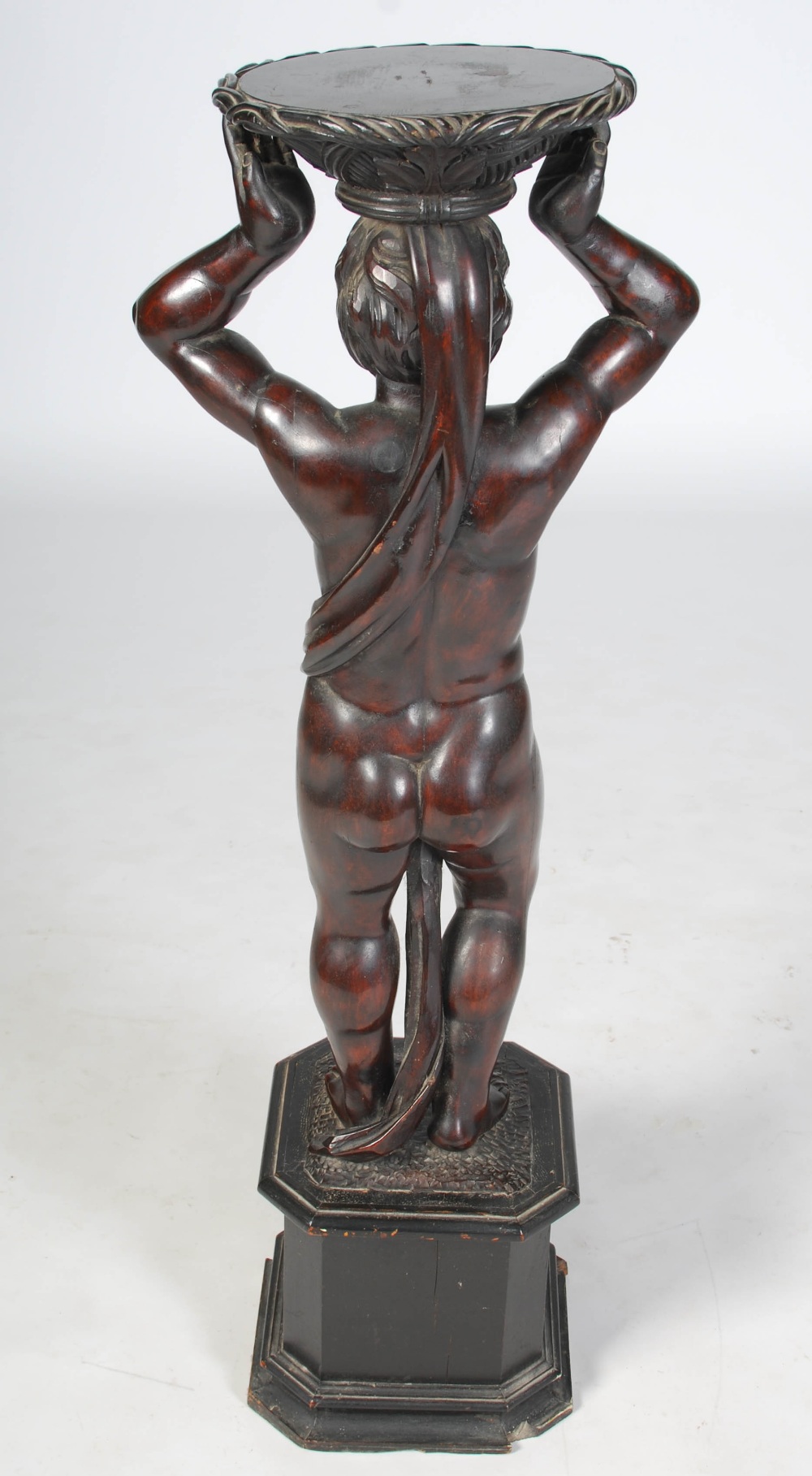 A late 19th century carved and stained wood figural torchere, carved with a semi clad male figure - Image 8 of 10