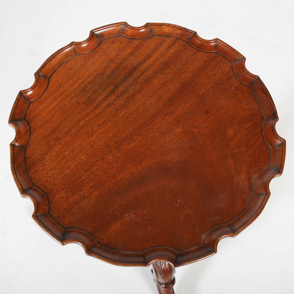 A George III style mahogany tripod occasional table, the circular top with pie crust edge, raised on - Image 2 of 4