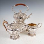 A George V silver three piece tea set, London, 1919 and later, makers mark of Goldsmiths &