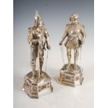 A pair of early 20th century silver, ivory and semi-precious stone set knights, one modelled