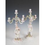 A pair of late 19th/early 20th century Dresden porcelain four light candelabra, the detachable