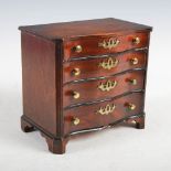 A late 19th/early 20th century George III style apprentice made serpentine chest, the shaped