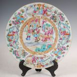 A Chinese porcelain famille rose Canton dish, Qing Dynasty, decorated with figures on terrace within