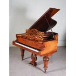 A walnut cased boudoir grand piano, F. Kaim & Shone, Kirchheim, Stuttgart, raised on tapered