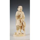 A Japanese ivory okimono of a figure smoking an opium pipe, Meiji Period, signed on red lacquer