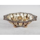 An Edwardian silver bon bon dish, Chester, 1906, of pierced circular form with scroll and foliate