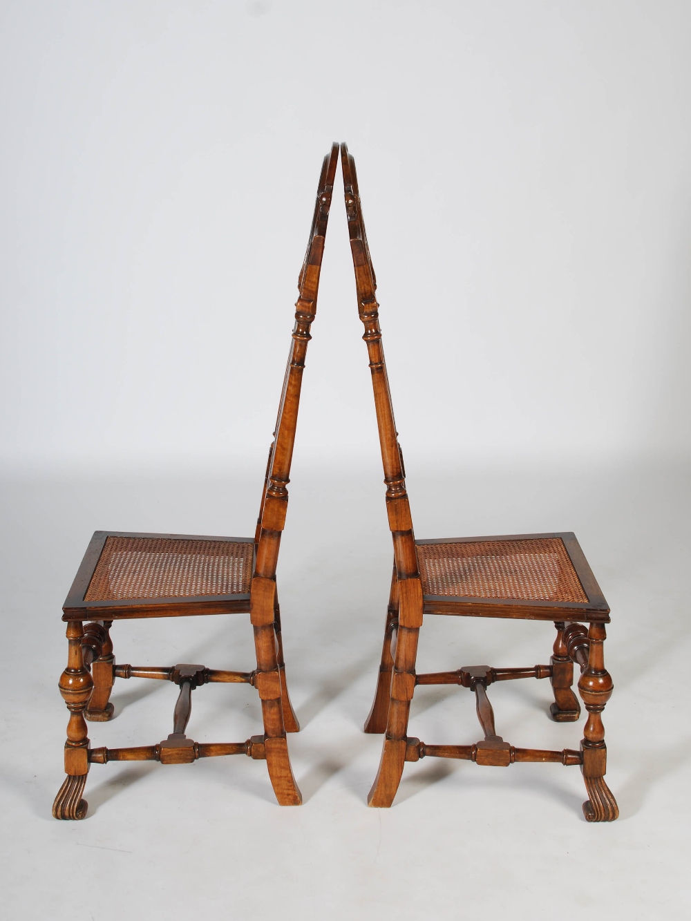 A pair of late 19th/early 20th century Continental walnut hall chairs, the upright backs with - Image 4 of 5