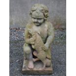 A 19th century carved stone figure of a boy and dog, on square plinth base, 93cm high