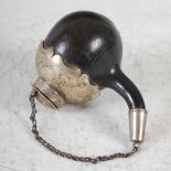 A late 18th/early 19th century white metal mounted nut form powder flask, with detachable circular