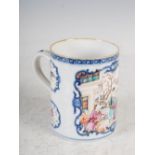 A Chinese porcelain famille rose mug, Qing Dynasty, decorated with a panel of Mandarin figures, 12cm