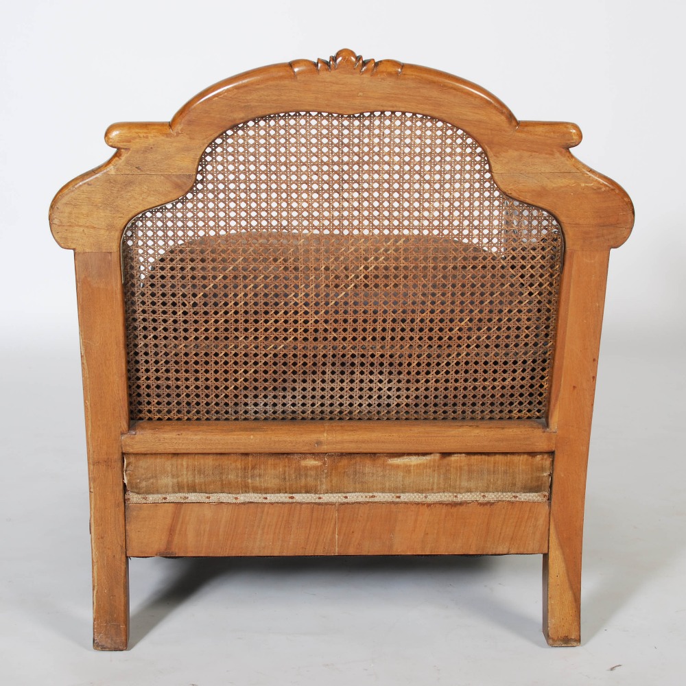 An Edwardian walnut three piece Bergere suite, comprising; three seat sofa and two armchairs, with - Image 6 of 7