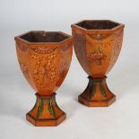 A pair of 19th century painted satinwood hexagonal shaped urns, decorated with ribbon tied baskets