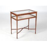 An Edwardian mahogany and chequer banded bijouterie table, the hinged rectangular top opening to a