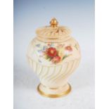 A Royal Worcester ivory ground pot pourri jar and two covers, dated 1900, decorated with foliate