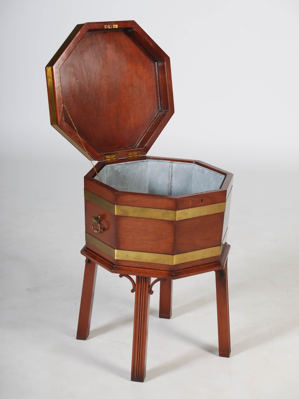 A reproduction George III mahogany and brass bound octagonal shaped wine cooler, the hinged cover - Image 2 of 5