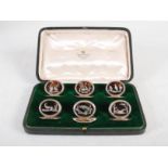 A cased set of six George V silver and tortoiseshell place card holders, Birmingham, 1912, makers