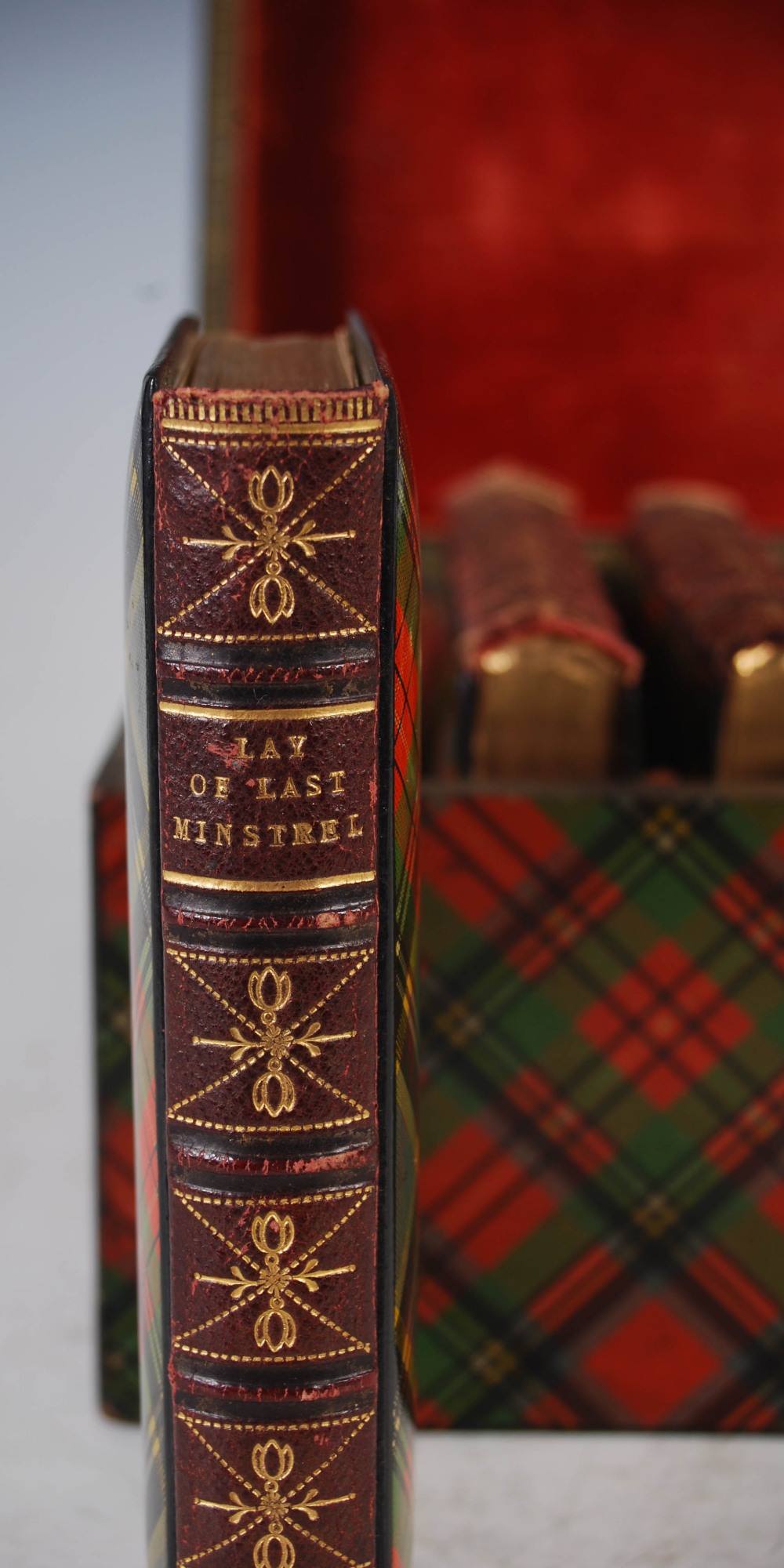 A 19th century tartan ware box containing six tartan ware bound volumes of Scott's Poetical Works, - Image 5 of 16