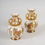 A pair of miniature Satsuma pottery twin handled bottle vases, Meiji Period, decorated with