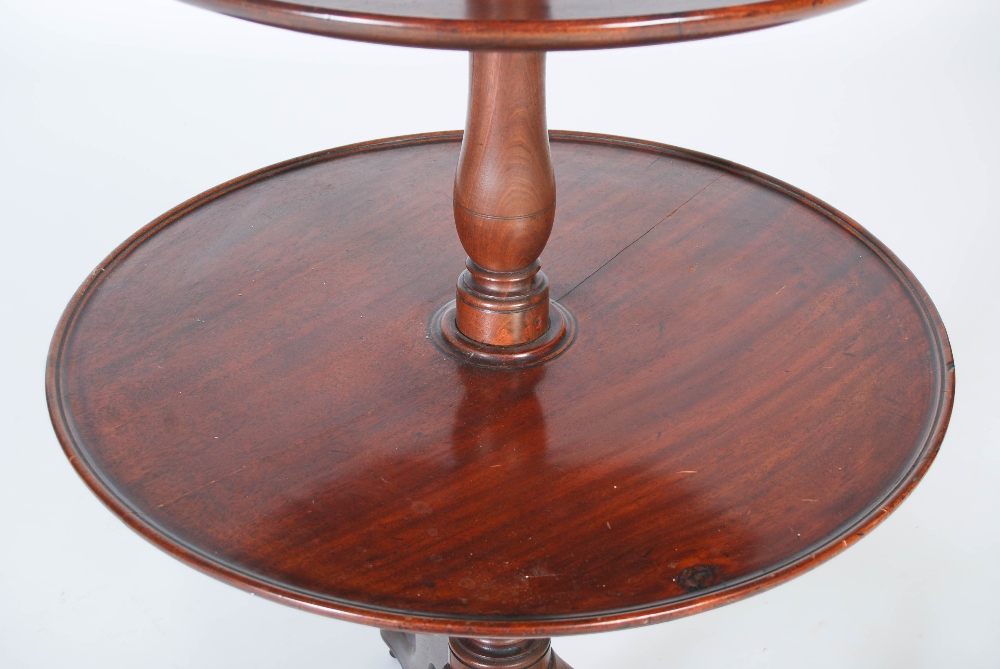 A George III mahogany three tier revolving dumb waiter, the graduated revolving stand supported on - Image 5 of 6