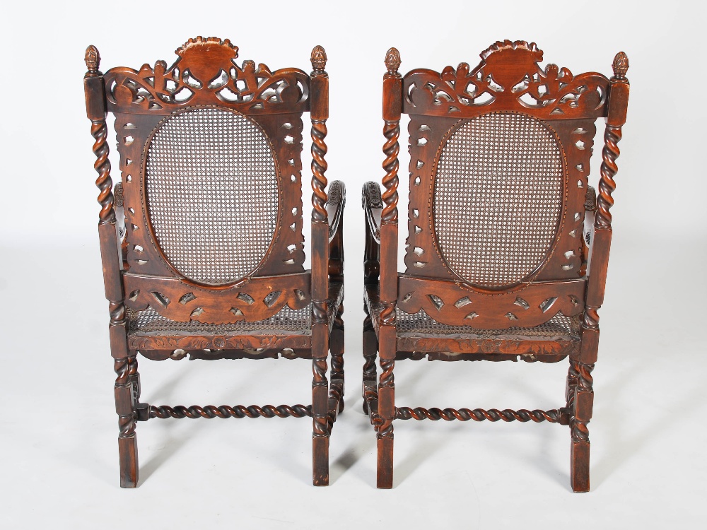A pair of late 19th century Carolean style carved walnut armchairs, the top rails carved and pierced - Image 6 of 6