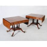 A pair of 19th century mahogany, rosewood and brass inlaid sofa tables, the rectangular tops with