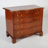 A 19th century mahogany serpentine chest, the shaped rectangular top with a moulded edge, above a