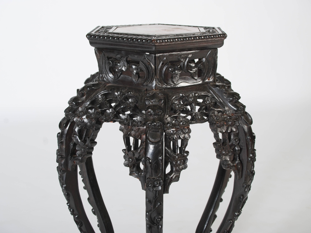 A Chinese dark wood hexagonal shaped jardiniere stand, Qing Dynasty, the shaped top with a mottled - Image 3 of 4