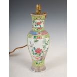 A Chinese porcelain yellow ground famille rose vase converted to a table lamp, Qing Dynasty,