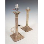 A pair of Edwardian electroplated Corinthian column table lamps, 29cm high