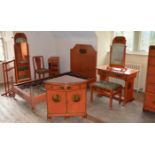 An early 20th century eleven piece bedroom suite by Whytock & Reid, Edinburgh, comprising; two