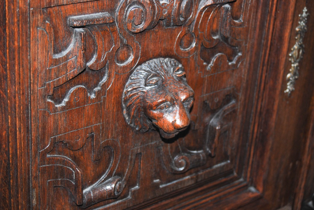 A late 19th century oak sideboard, the upright back with two bevelled mirror recesses and two - Image 8 of 8