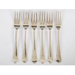 A set of six George III silver fruit forks, Newcastle, makers mark TW, Old English, engraved with