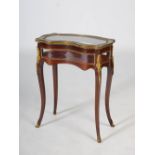 A late 19th century rosewood and ormolu mounted kidney shaped bijouterie table, the hinged top