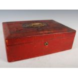 A late 19th century red leather deed box by John Peck & Son, the hinged cover with recessed brass