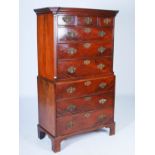A George III mahogany chest on chest, the moulded cornice above three short and three long graduated