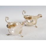 A pair of Edwardian silver sauce boats, Sheffield, 1905, makers mark of Walker & Hall, with