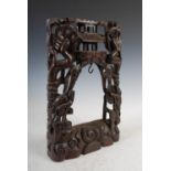 A Chinese dark wood and silver wire inlaid gong stand, Qing Dynasty, carved and pierced with a