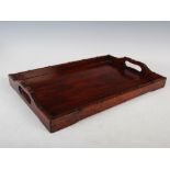 A Chinese dark wood rectangular tray, late Qing Dynasty, with simulated bamboo carved gallery and