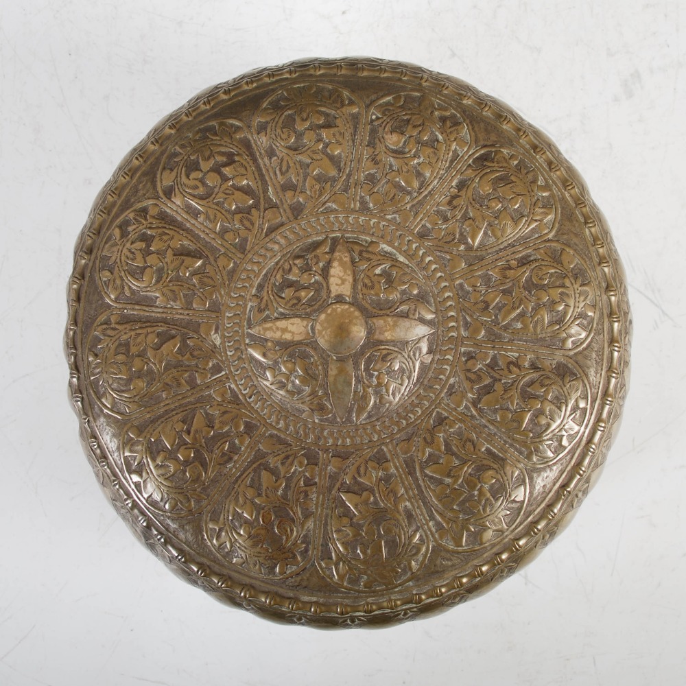 A late 19th century Indian white metal circular box and cover, decorated with embossed panels of - Image 2 of 4