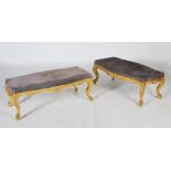 A pair of Victorian style gilt wood stools, the rectangular upholstered tops with a serpentine edge,