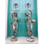 A pair of decorative 20th century cold painted bronze figural torcheres, modelled as maidens with