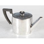 A George III silver bachelors teapot, London, 1775, makers mark I.R., the cylindrical body with